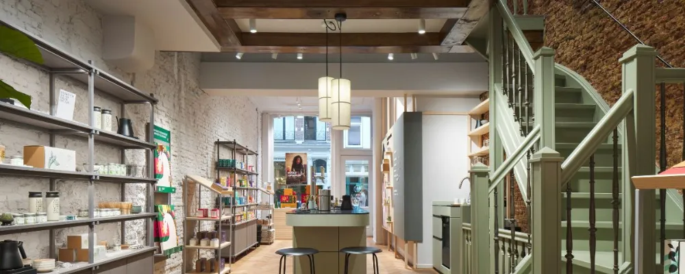 TRILUX ilumina la expansión global de Paper & Tea